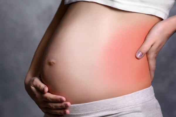 Болит в левом боку во время беременности