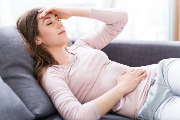 Болит голова и низ живота во время месячных